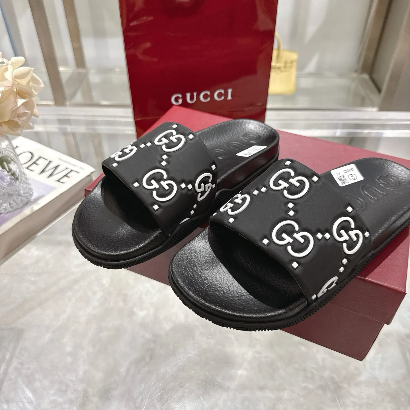 🅿️300💰 🌹Gucci official website Good Game slippers and sandals for men and women. In this special edition series, the acronym of the brand founder Guccio Gucci gives new meaning. In the gaming world, "GG" is a symbol of good sportsmanship and stands for "Good Game," which conveys the value system of the community. The modern acronym is a playful ode to the brand’s origins in the world of sports and leisure, illustrating how Gucci’s heritage continues to evolve. The parting greeting expresses the Gucci Good Game motto as the brand moves into new worlds, creating centers of play, self-expression, talent, freedom and individuality. Made with a rubber upper, these slippers are embellished with the collection's signature logo.  Rubber upper, unisex, G logo embossed, molded footbed, rubber sole, flat, made in Italy, sizes 36 to 46